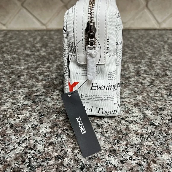 DKNY cosmetic bag. Brand new with tag. NYC scenery makes this a special item! - Picture 3 of 6